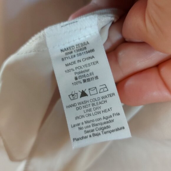 Naked Zebra blouse with tie front closure and ruffle detail on the neck sleeve - Picture 5 of 6